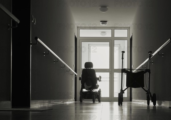 Lonely corridor with rollator in a retirement home