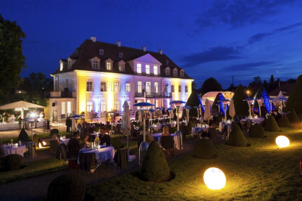Summer night ball at Wackerbarth Castle. Schloss Wackerbarth or Wackerbarths Ruh' is a baroque