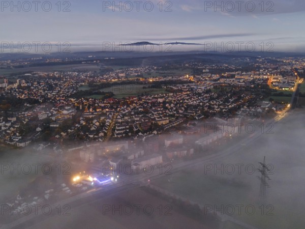 Fog rolls in over the Oberursel district of Weißkirchen, near Frankfurt am Main, in the morning,