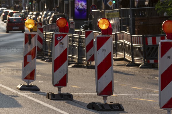 Traffic, roadworks in the evening light, barriers and warning signs on the carriageway, Hamburg,