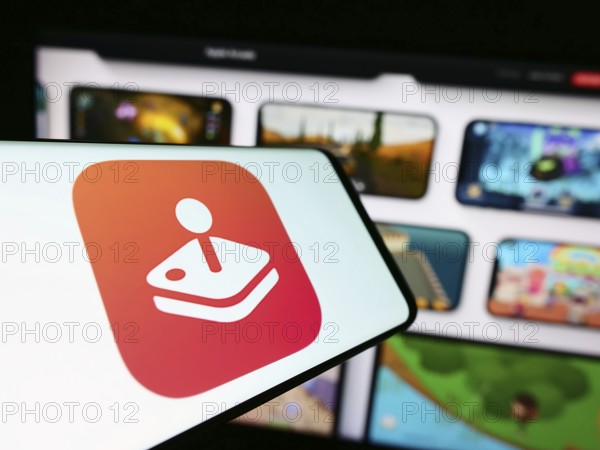 Stuttgart, Germany, 09-23-2023: Cellphone with logo of video game platform Apple Arcade on screen