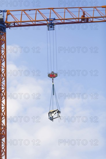 Circular table saw suspended from a crane