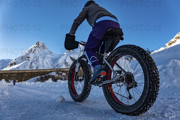 Mountain bike in the alps in the snow