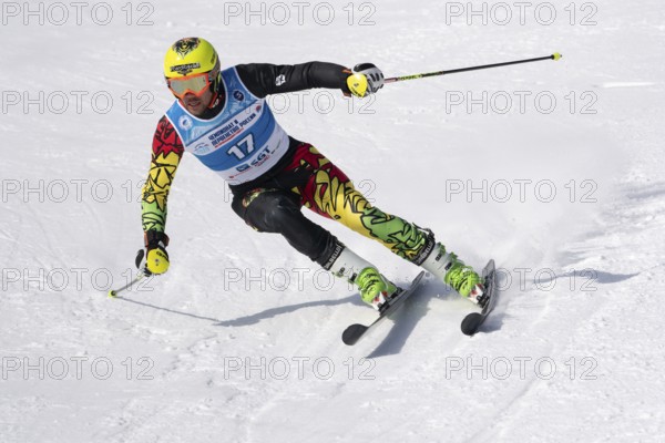 Bolivia mountain skier Breitfuss Kammerlander Simon skiing down mount slope giant slalom.