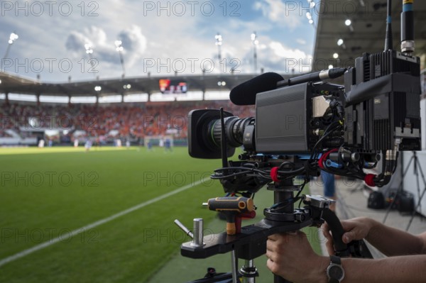 TV camera on the stabilizer at football stadium