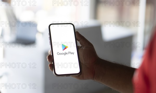 Google play store logo is displayed on smartphone, Dhaka, Bangladesh 05 September 2024.