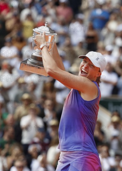 French Open 2024 Champion Iga Swiatek of Poland is holding the trophy at Roland Garros, Paris,