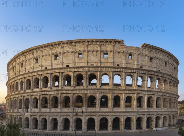 Colosseum at sunrise in Rome, Italy, Europe. Rome ancient arena of gladiator fights. Rome Colosseum