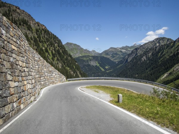 Tight bend, Alpine peaks behind, Silvretta High Alpine Road, Vorarlberg, Austria, Europe