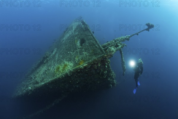 Divers on the wreck of the Umbria, Wingate Reef, Red Sea, Sudan, Africa