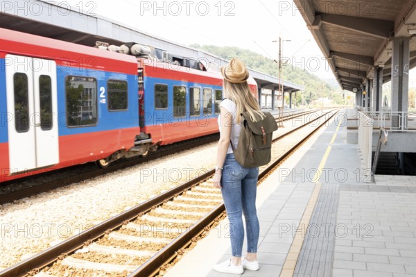 Traveller woman train station