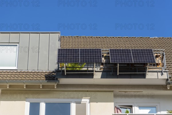 Balcony power station on a balcony of an attic flat in Düsseldorf, Germany, Europe