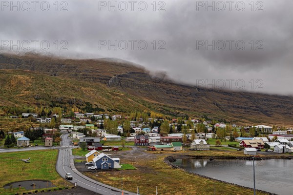 Scenic view of small town Seydisfjordur on Eastside of Iceland in a cloudy day