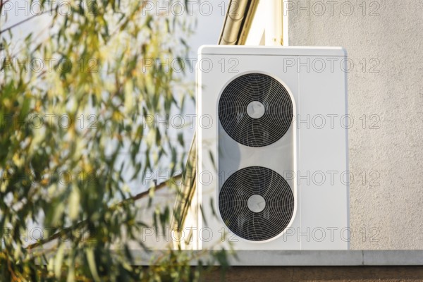 A heat pump on the roof of a garage in Langenfeld, Germany, Europe