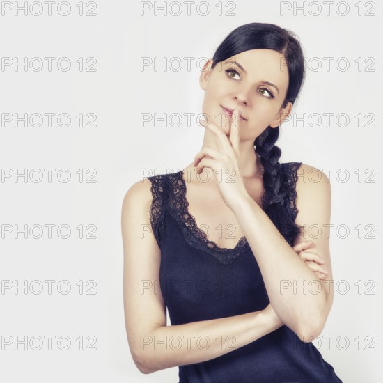 young woman is thinking about something
