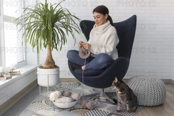 Woman home knitting 3