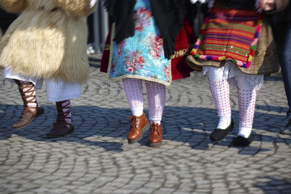 Traditional Hungarian Sokrac dancers in the main square at the Busojaras Spring festival 2010