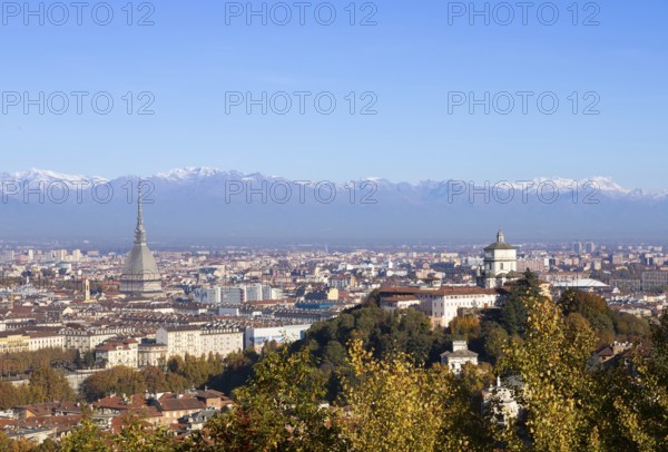 Turin, Italy - Circa November 2021: panorama with Alps and Mole Antonelliana, . Skyline of the