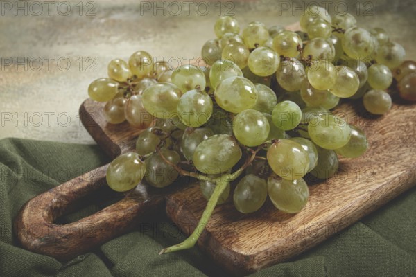 A branch of white grapes, wine grapes, Georgian grape variety Rkatsiteli, top view