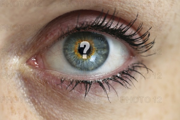Eye with question mark in the pupil concept