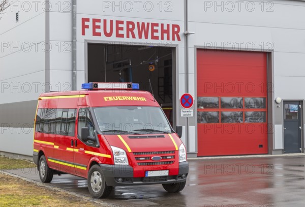 Fire brigade vehicle in front of fire station in Bavaria