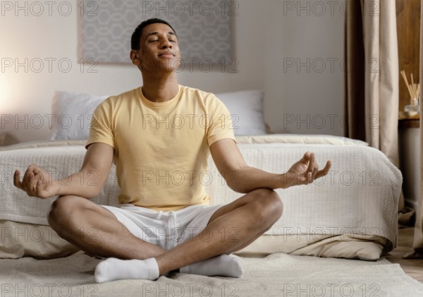 Portrait man home meditating