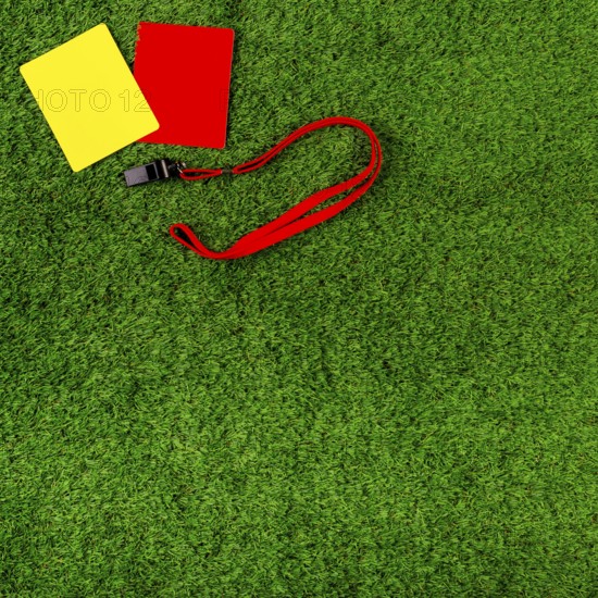 Football composition with red yellow cards