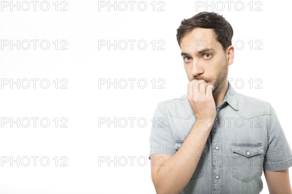 Nervous man looking camera