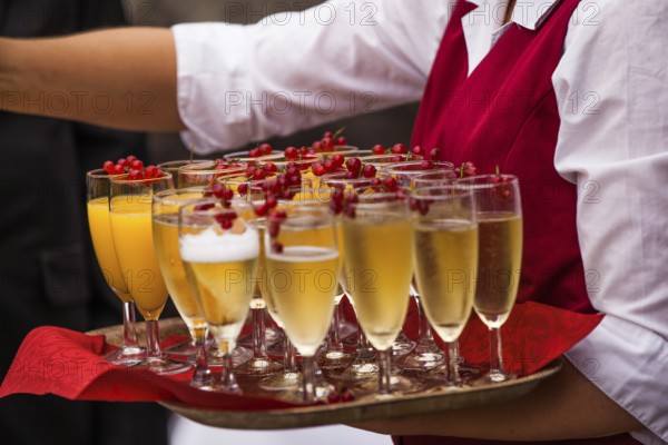 Glasses of champaign being served