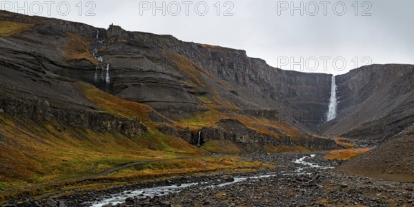 Hengifoss waterfall in eastside of Iceland in a cloudy day