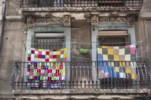 Colourful laundry on a washing line in the Barcelonata district of Barcelona, Spain, Europe