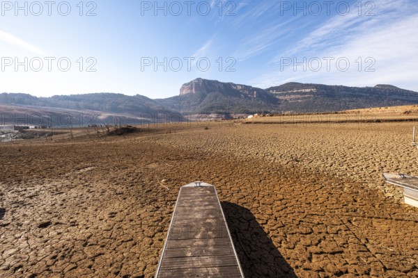 Dock on dry land at the Panta de Sau reservoir with water four percent of its capacity in the worst