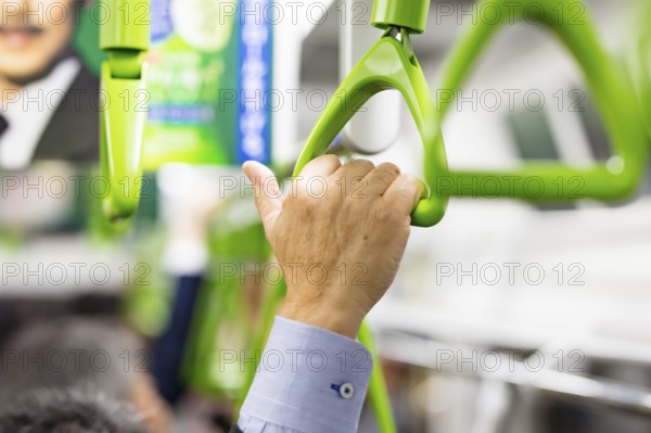The handles in a train on the JR Yanamoto Line in Tokyo, Japan, Asia