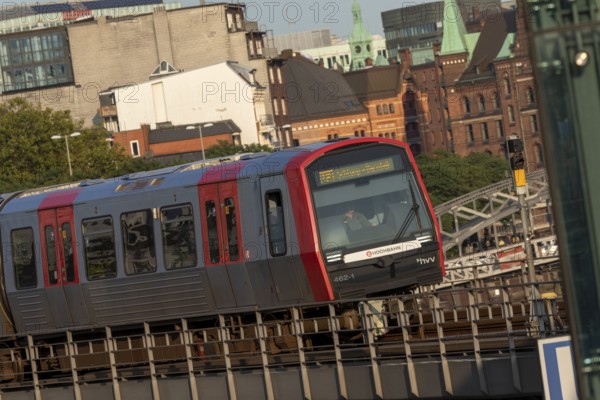 Underground, Hamburger Verkehrsverbund HVV, local transport, railway line in the evening light with