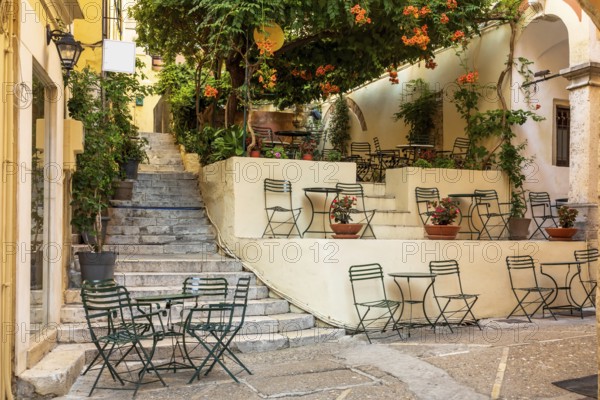 Cafe in an alleyway in the old town of Kerkyra, Corfu
