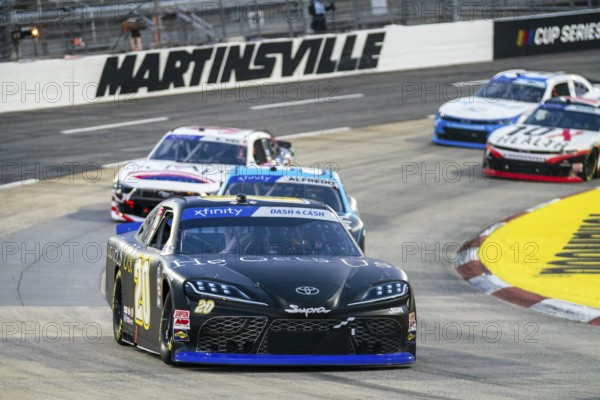 Aric Almirola races for position for the DUDE Wipes 250 in Martinsville, VA, USA, North America