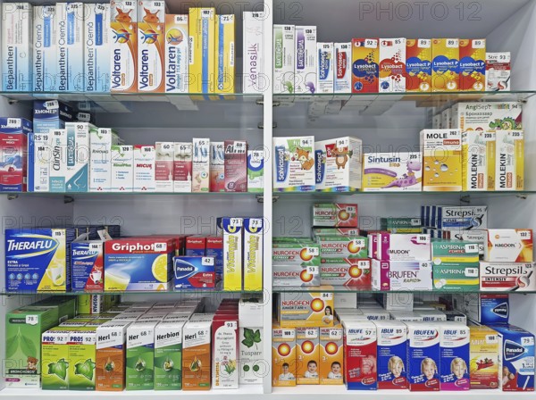 UNGHENI, MOLDOVA, DECEMBER 20, 2023 View of pharmacy stocked shelves with medicine against flu.