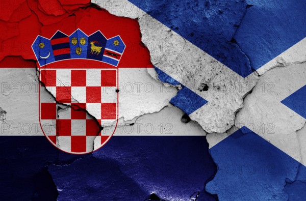 Flags of Croatia and Scotland painted on cracked wall