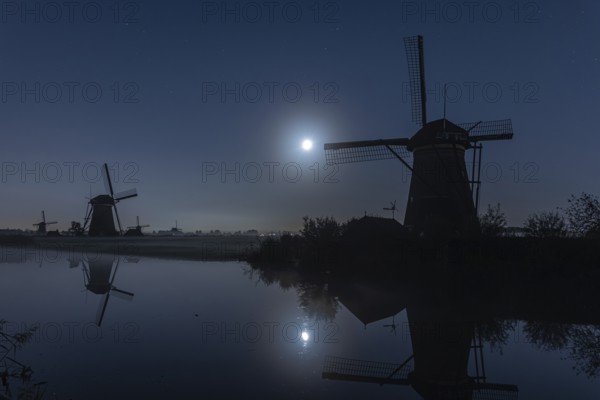 Foggy moonlit night at Kinderdijk, Netherlands