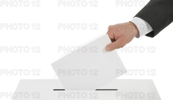 Man's hand down the ballot in the ballot box. Isolated on white