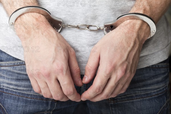 Police law steel handcuffs arrest crime human hand
