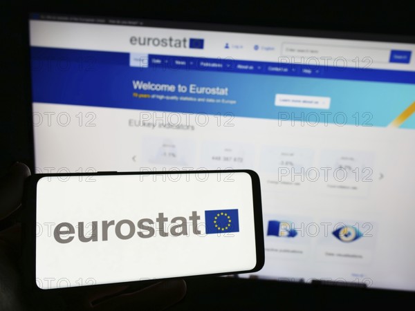 Stuttgart, Germany, 11-02-2023: Person holding smartphone with logo of EU institution European