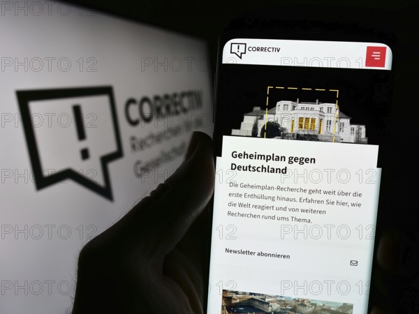 Stuttgart, Germany, 03-05-2024: Person holding smartphone with webpage of Correctiv, Recherchen für