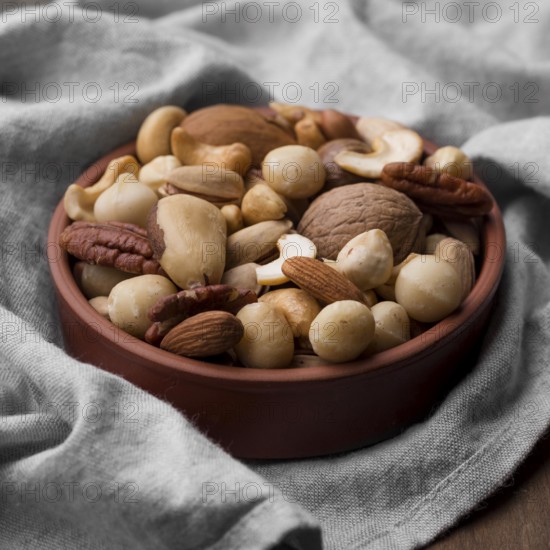 High view delicious snack nuts bowl