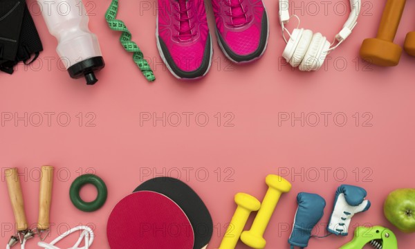 Flat lay sneakers with gym essentials