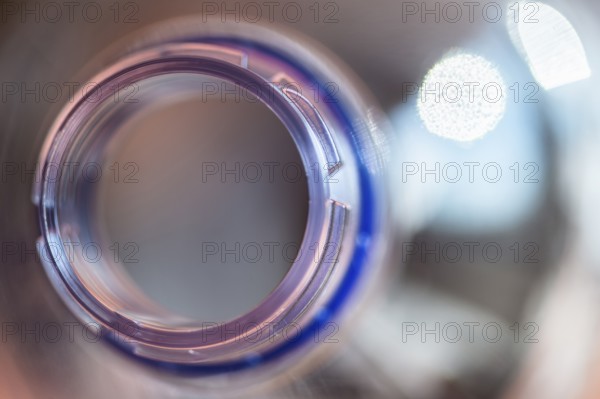Close-up of the opening of a plastic bottle