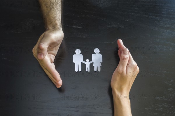 Great concept of family and protection with the hands