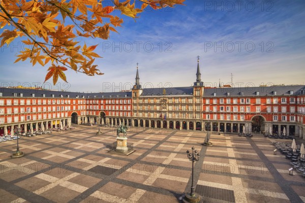 Madrid Spain, city skyline at Plaza Mayor with autumn leaf foliage