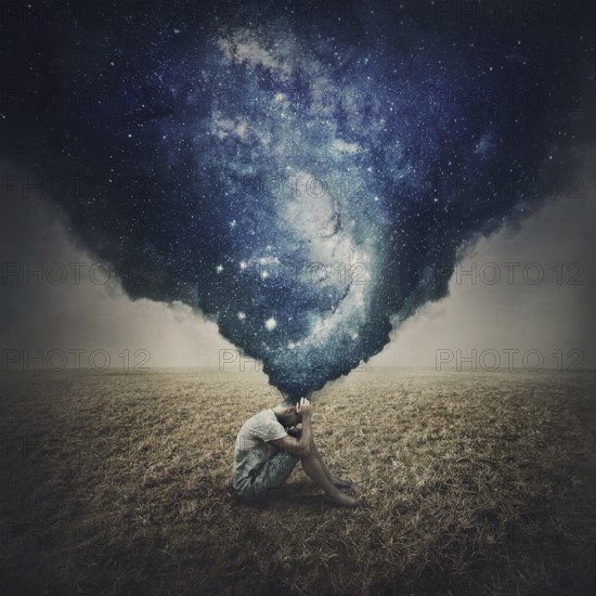 State of mind and mental health concept as a melancholic lone person seated in an open land suffers
