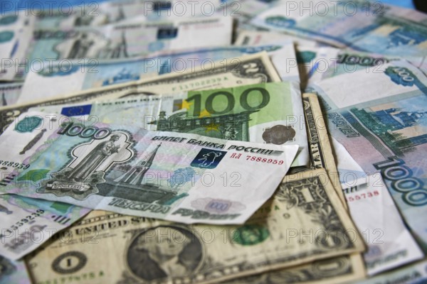 Background of paper bills dollars, euros and rubles